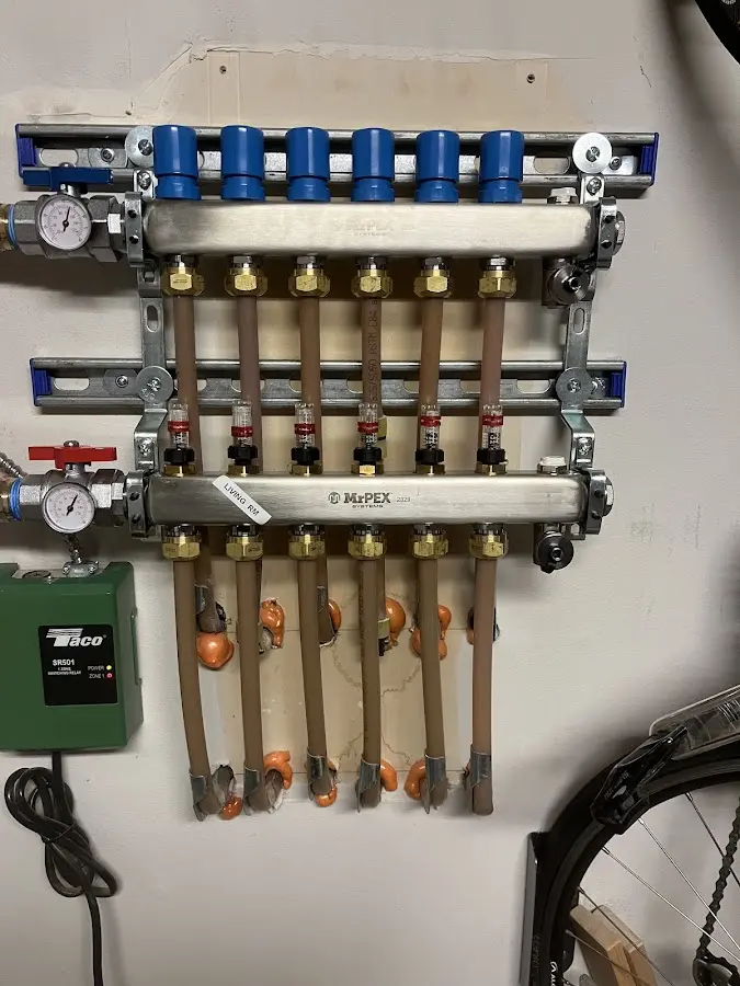 Plumber performing Gas Line Installation at a residential property in Macomb